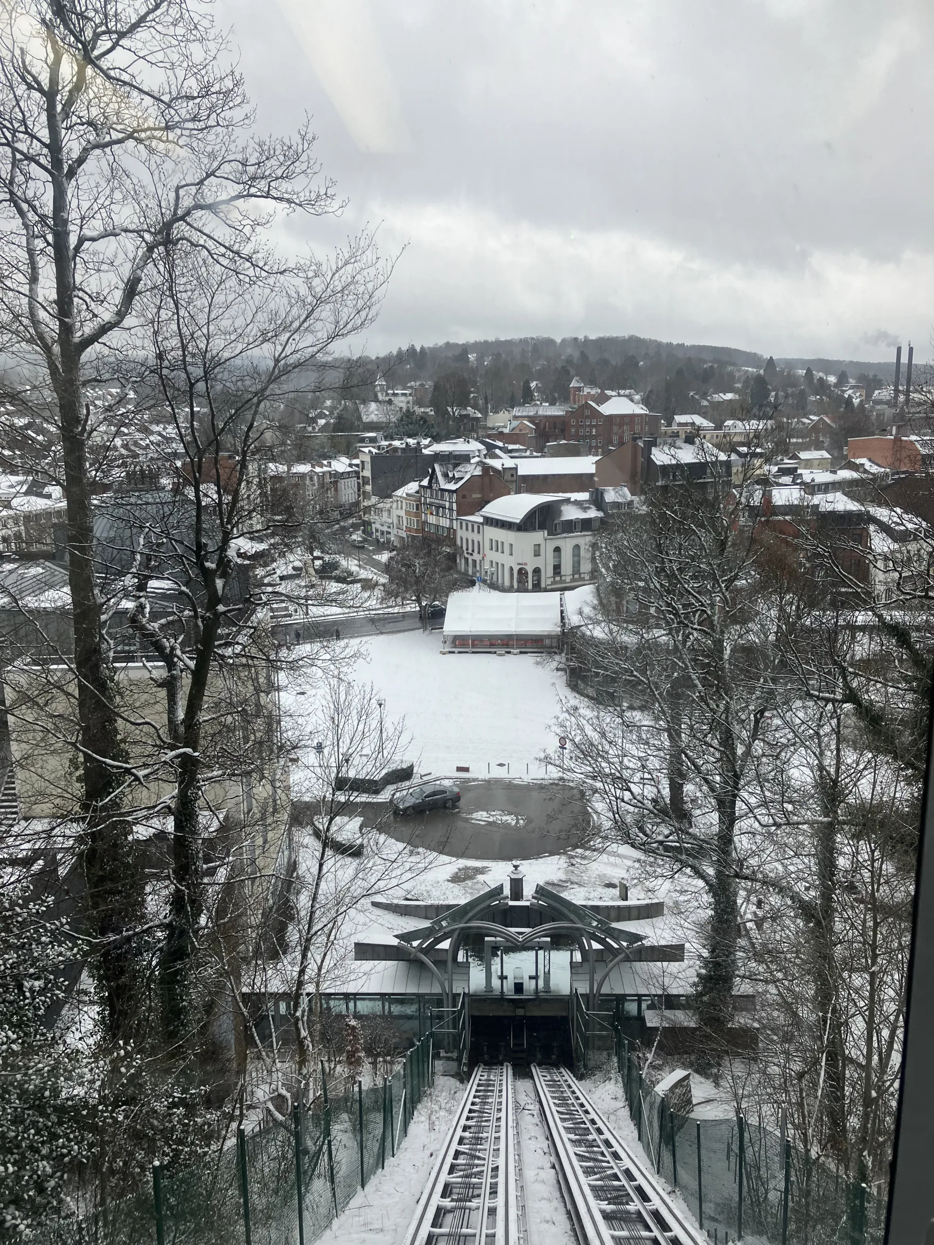 Snow covered train track going down in Spa, Belgium.